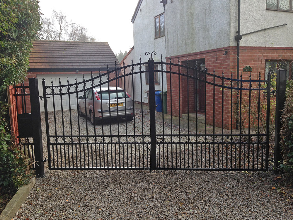 Wrought iron swinging gate