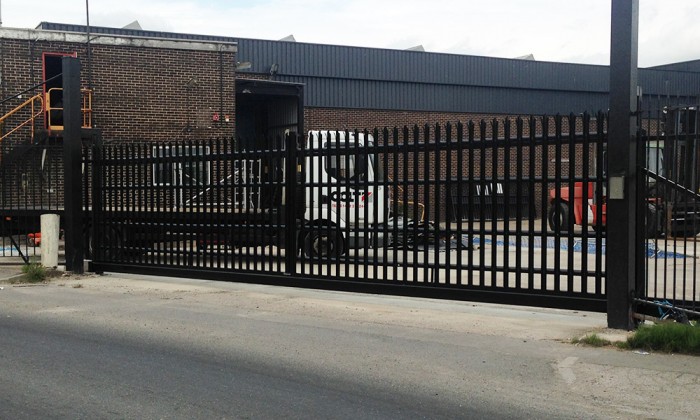 black commercial palisade cantilever gate